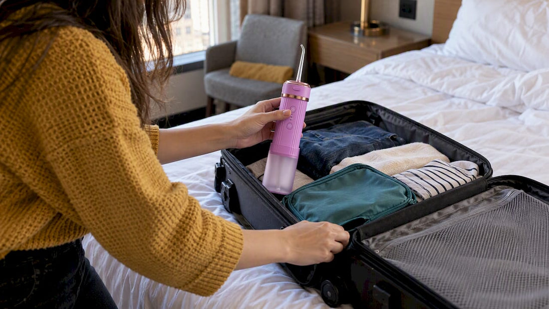 BLANCA water flosser beside an open carry-on